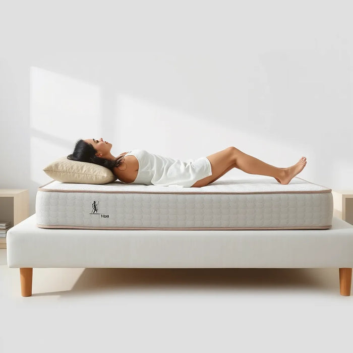 Supportive mattress firmness setup for back pain relief with a person lying comfortably on their back