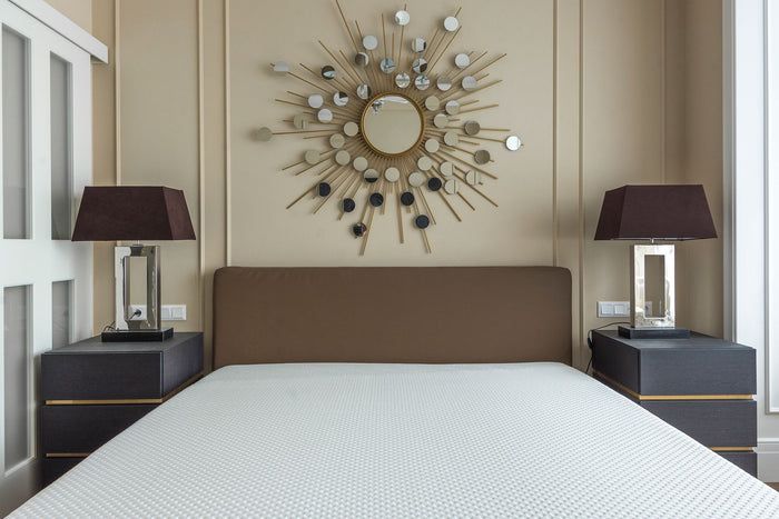 Modern bedroom featuring a minimalist design with stylish decor and furniture.