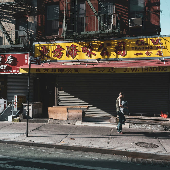 man walking on concrete pavement