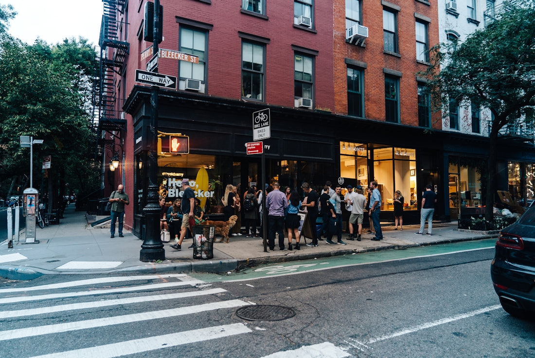 people standing near building