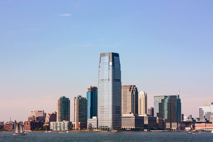 city skyline under blue sky during daytime
