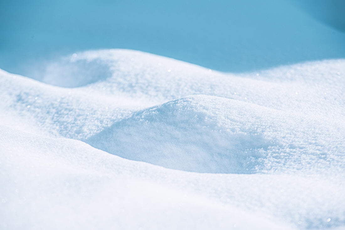 snow covered mountain during daytime