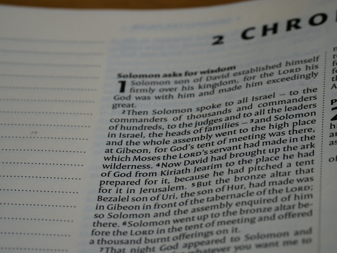 a close up of a book with a page in it