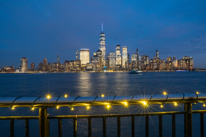 a view of a city at night from across the water