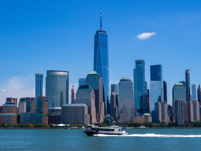 a city skyline with a boat