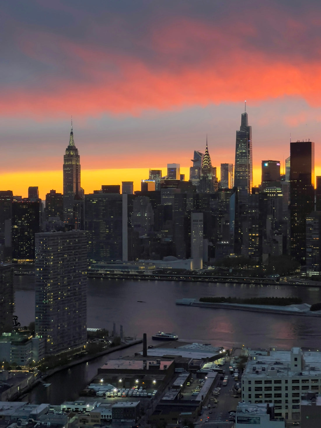 a city skyline at sunset