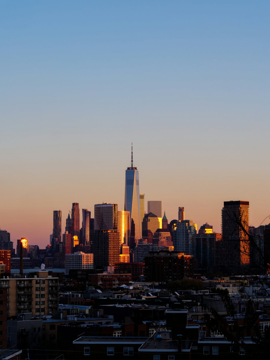 a city skyline at sunset
