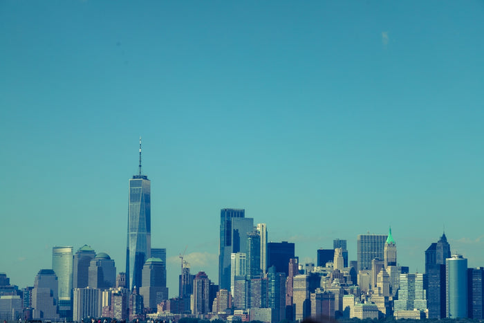 a view of a city skyline from across the water