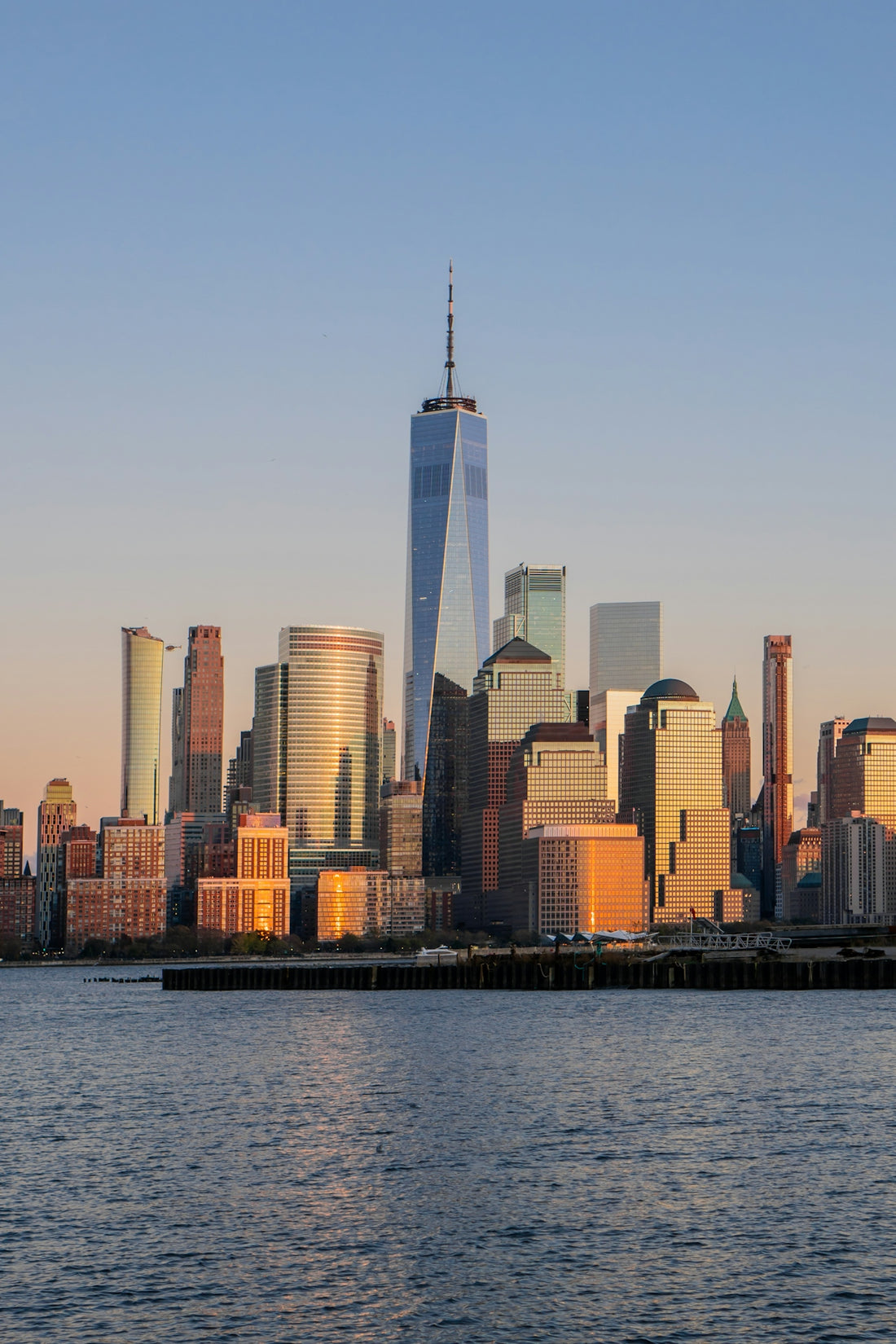 A large body of water with a city in the background