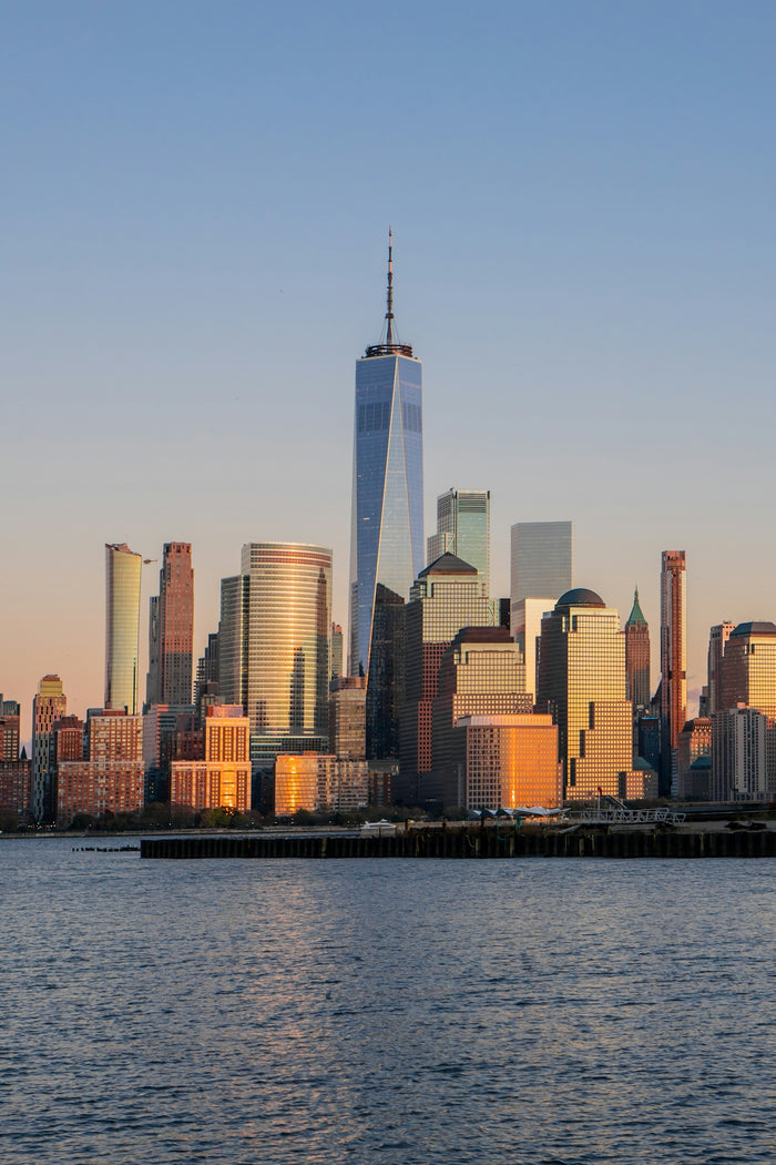 A large body of water with a city in the background