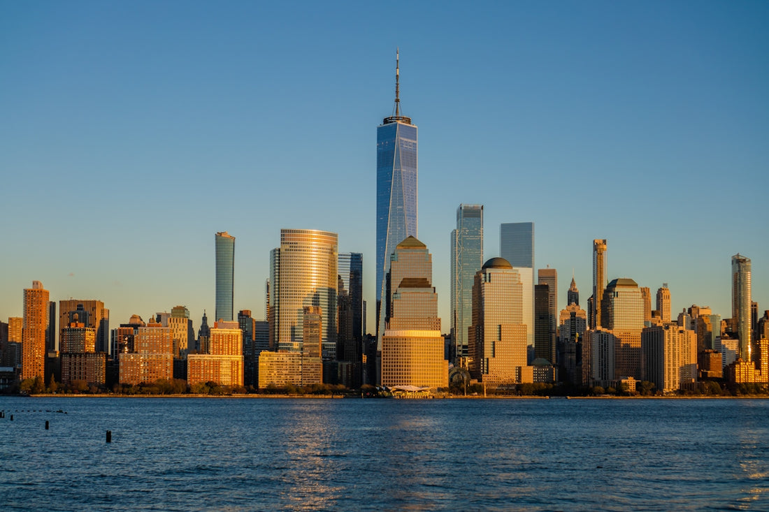 A large body of water with a city in the background