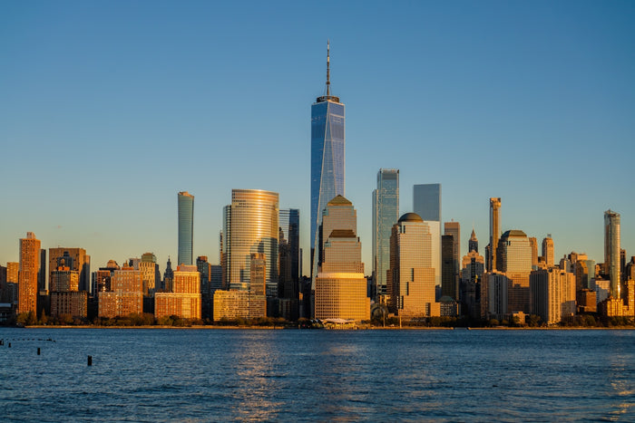 A large body of water with a city in the background