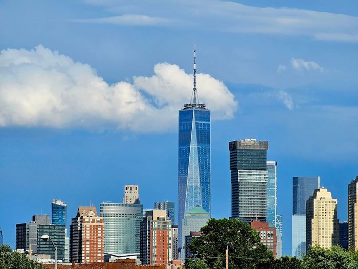 a view of a city with tall buildings