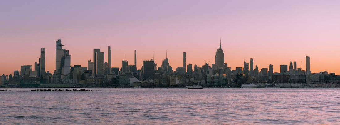 A large body of water with a city in the background