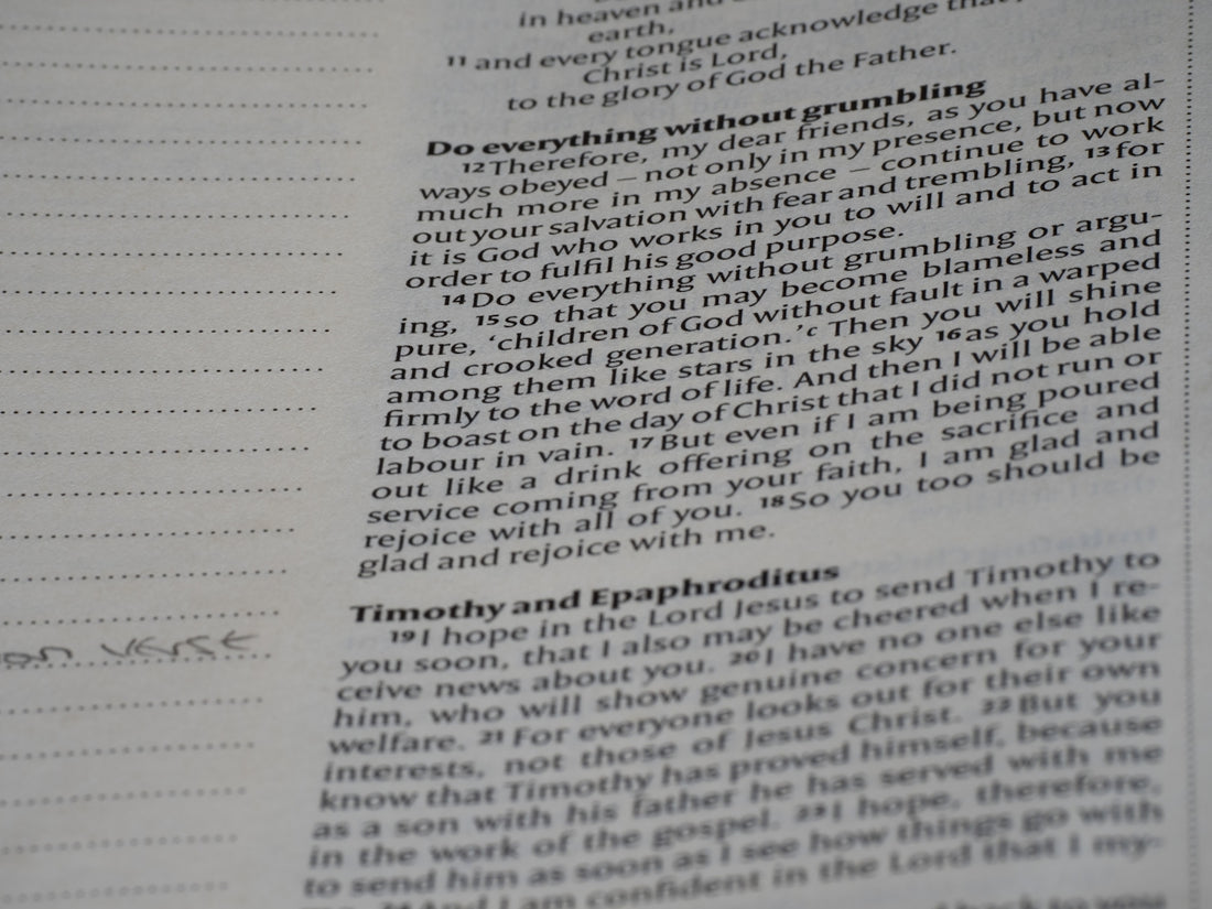 A close up of a book with writing on it