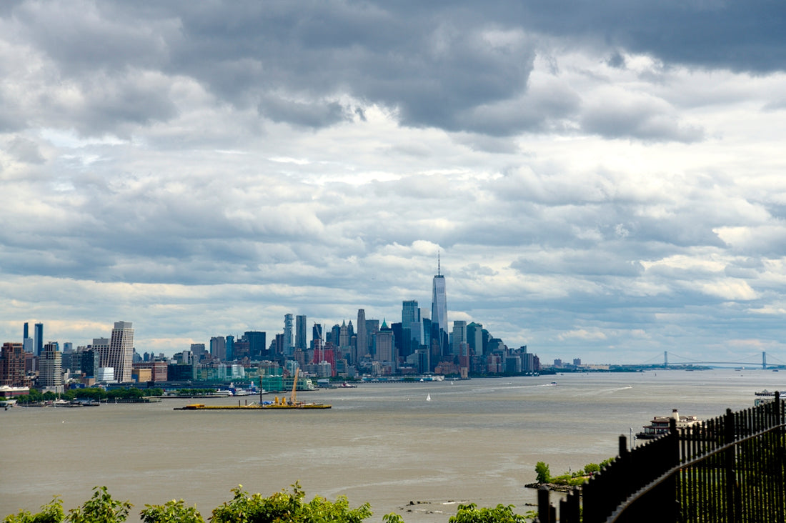 A skyline of new york city is seen.