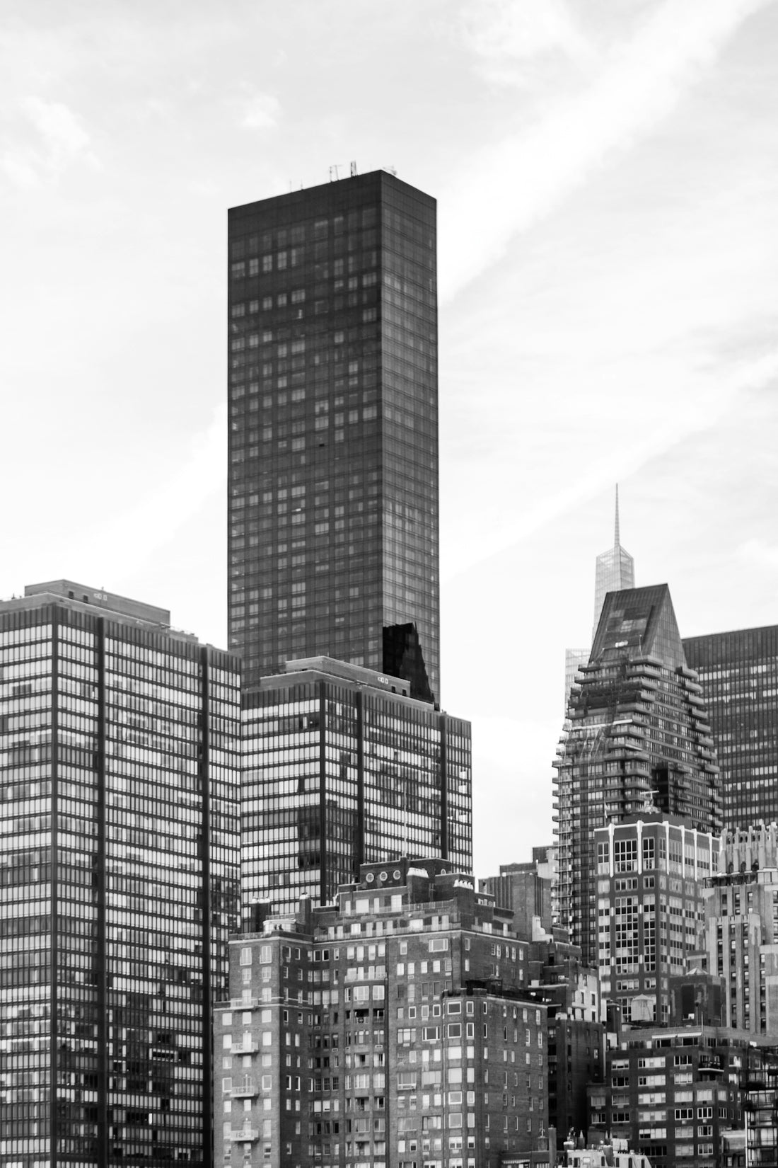 Skyscrapers dominate the cityscape in black and white.