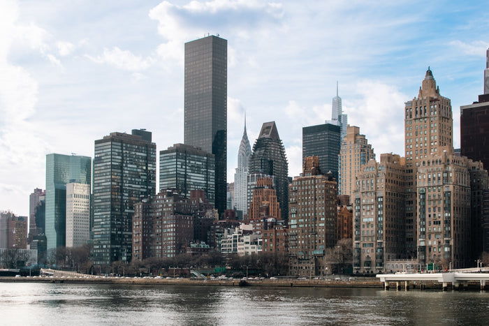 A new york city skyline view over water