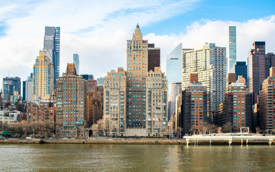 New york city skyline is visible across the water