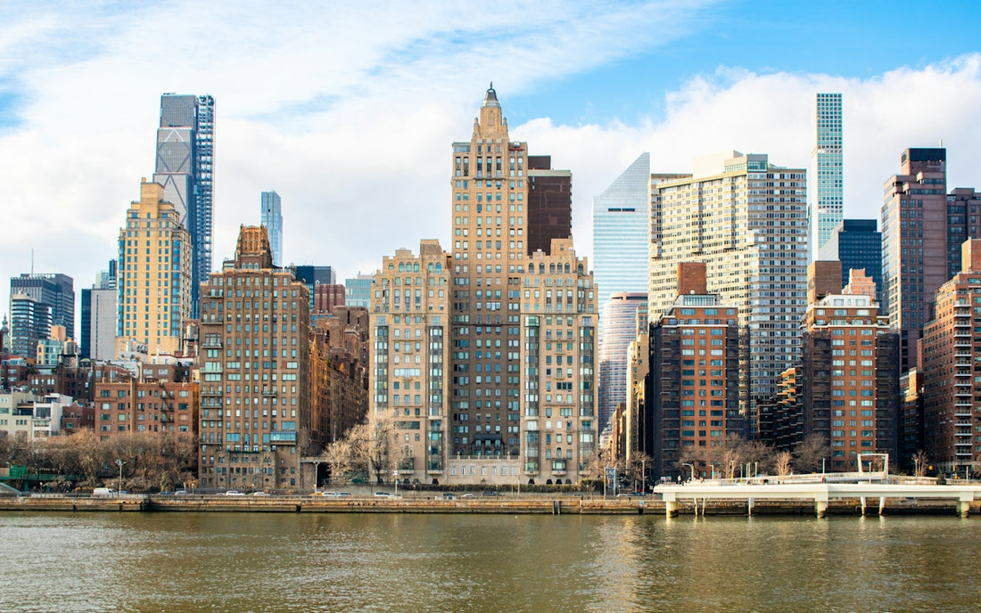 New york city skyline is visible across the water