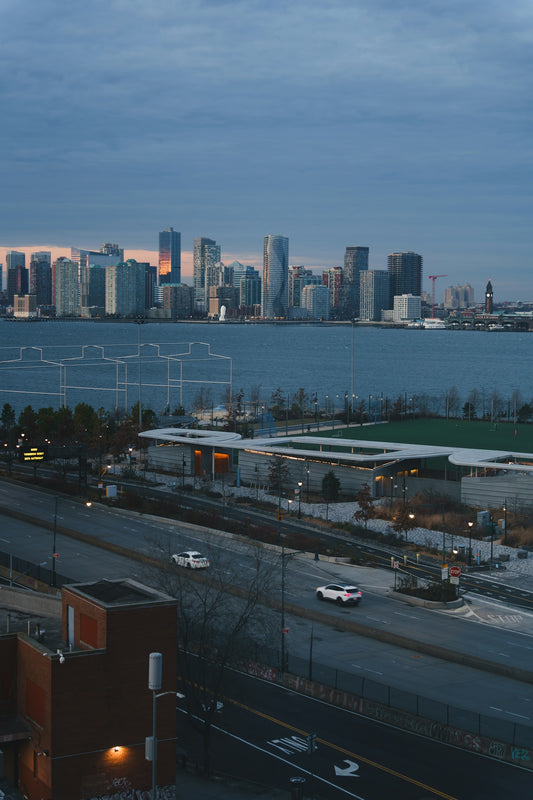 City skyline across the water at dusk.