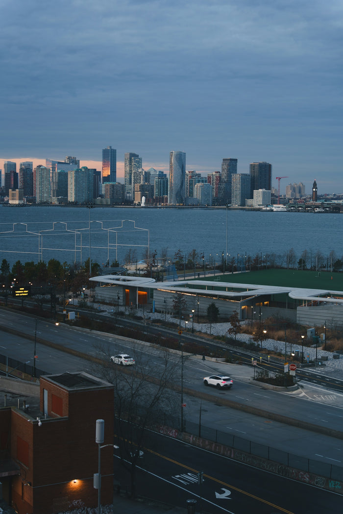 City skyline across the water at dusk.