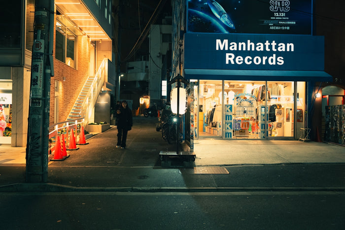 Manhattan records store at night with street lights