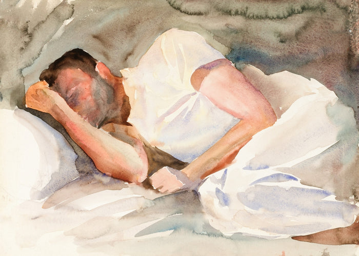 A man sleeping peacefully in bed