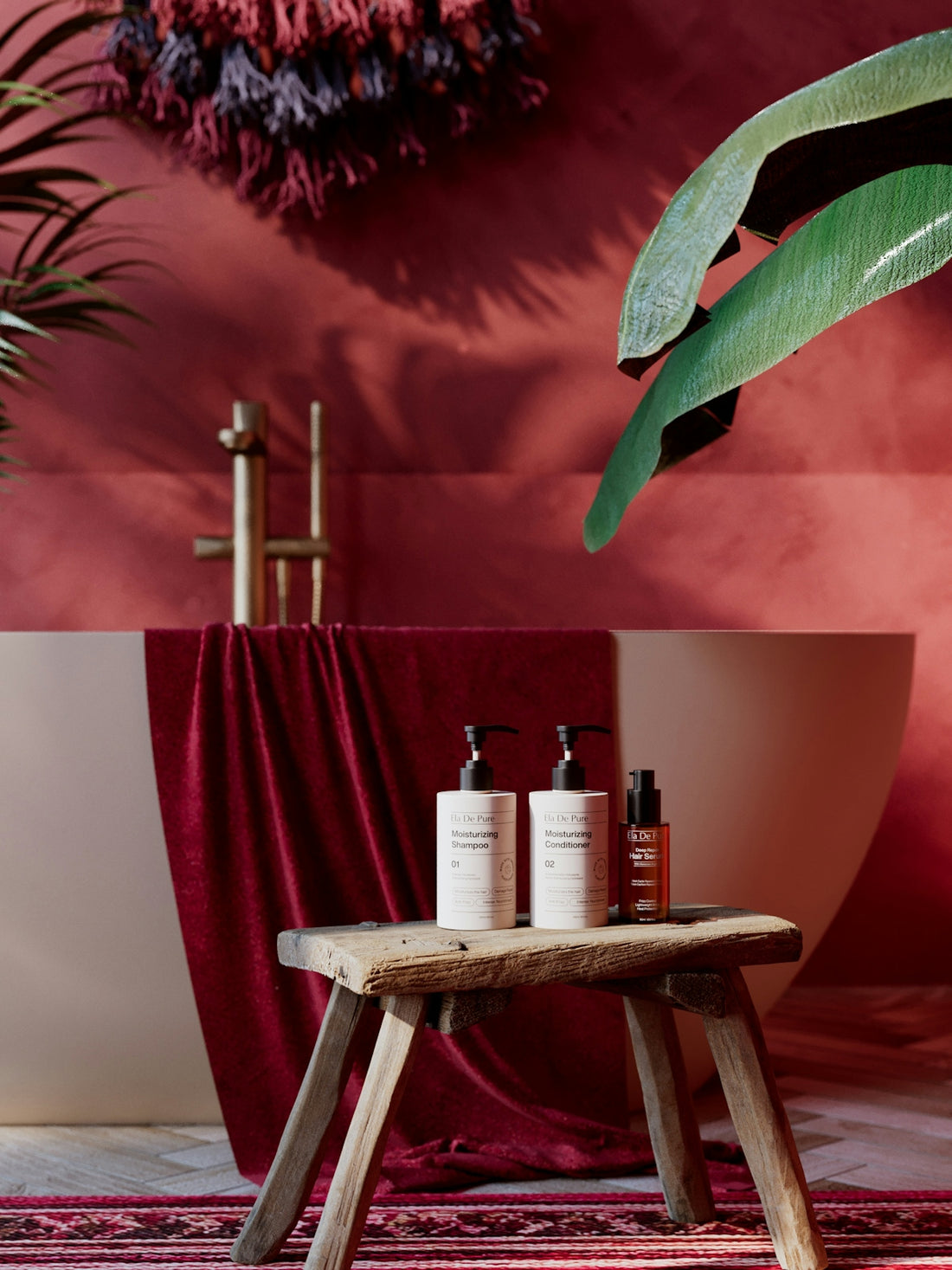Luxurious red bathroom with bath products on a wooden stool