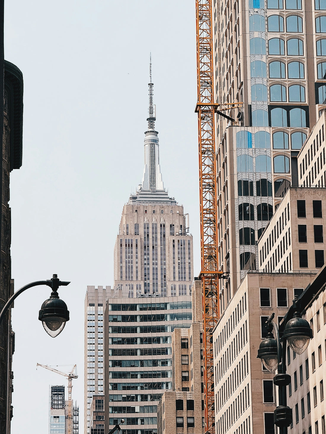 Iconic empire state building towering among new york city skyscrapers