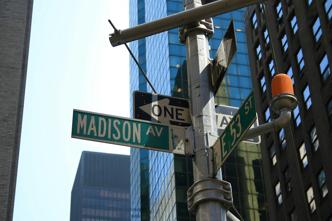 Street signs for Madison Avenue and East 53rd Street in New York City