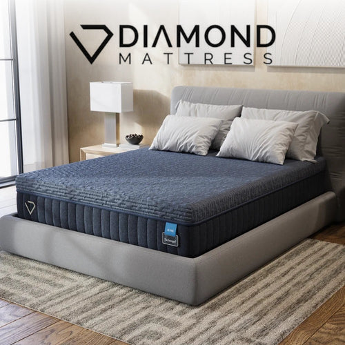 Diamond Mattress Technogel 3D Pro Hybrid in a bedroom with the Diamond Mattress logo